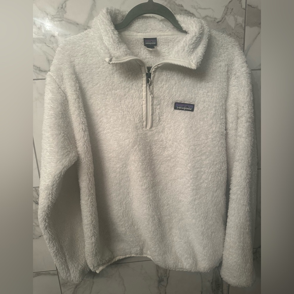 Patagonia New 1/4 Zip fluffy white pull-over.Never worn.Banded bottom.Beautiful